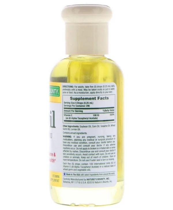 Une bouteille de Nature's Bounty - E-Oil, Huile Vitamine E, 30 000 UI, 74 ml sur fond blanc.