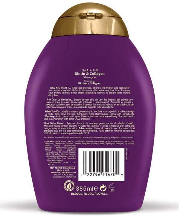 Une bouteille de OGX - Biotin & Collagen Shampoing, 385 ml avec une étiquette dorée et de couleur violette.