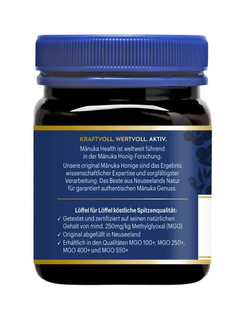 Un pot de 250 g de miel de Manuka 100 % pur de Nouvelle-Zélande, doté d'un couvercle bleu et étiqueté en allemand, mettant en valeur sa qualité premium MGO 250+. Parfaitement conçu par Manuka Health pour les connaisseurs exigeants.