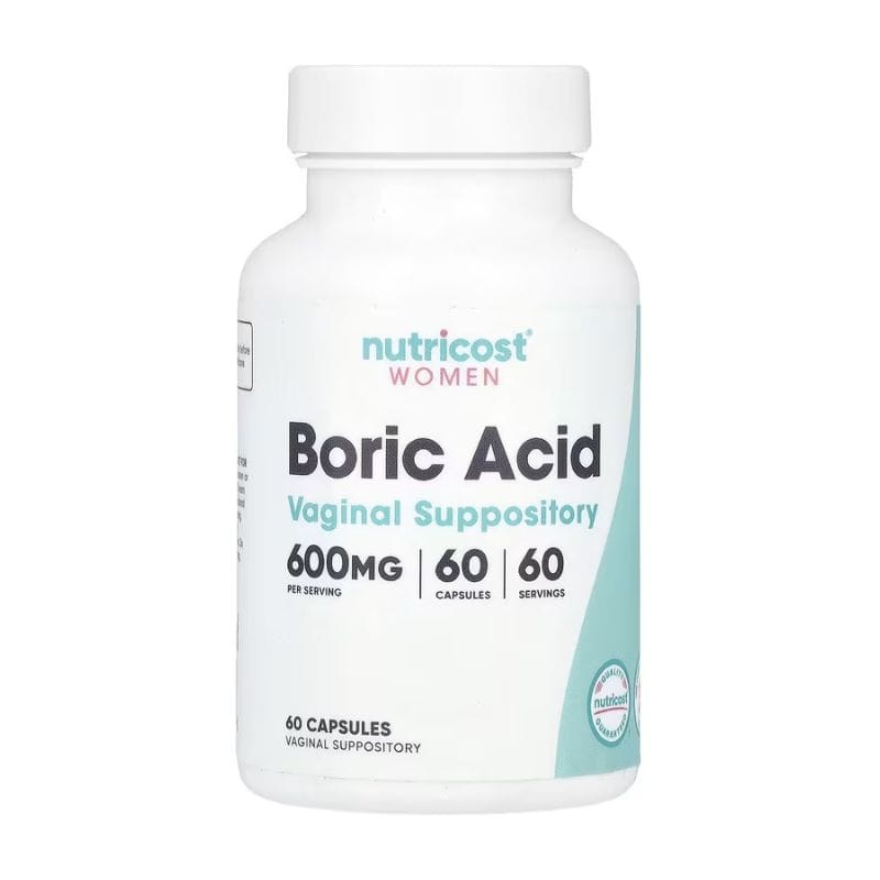 Un flacon blanc étiqueté "Nutricost Acide Borique Vaginal 600 mg - Équilibre pH & Anti-Candidose, 60 Suppositoires" fournit un soutien vaginal pratique et un équilibre du pH pour le bien-être intime.
