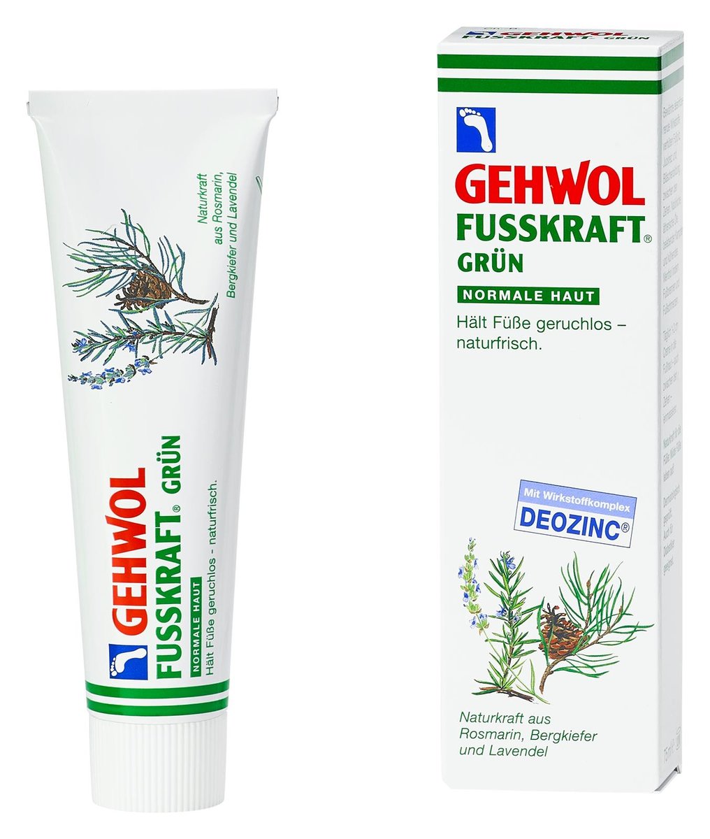 Un tube et un coffret de crème pour les pieds Gehwol Fusskraft Grün pour peaux normales, ornés d'illustrations d'herbes aromatiques et comportant les informations sur le produit en allemand.