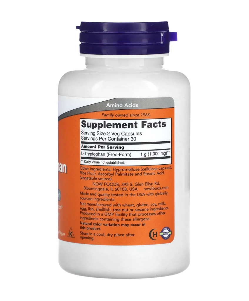 Une bouteille blanche de NOW Foods L-tryptophane, 500 mg, 60 capsules végétales, comportant une étiquette orange avec les informations sur les suppléments et les détails des ingrédients.